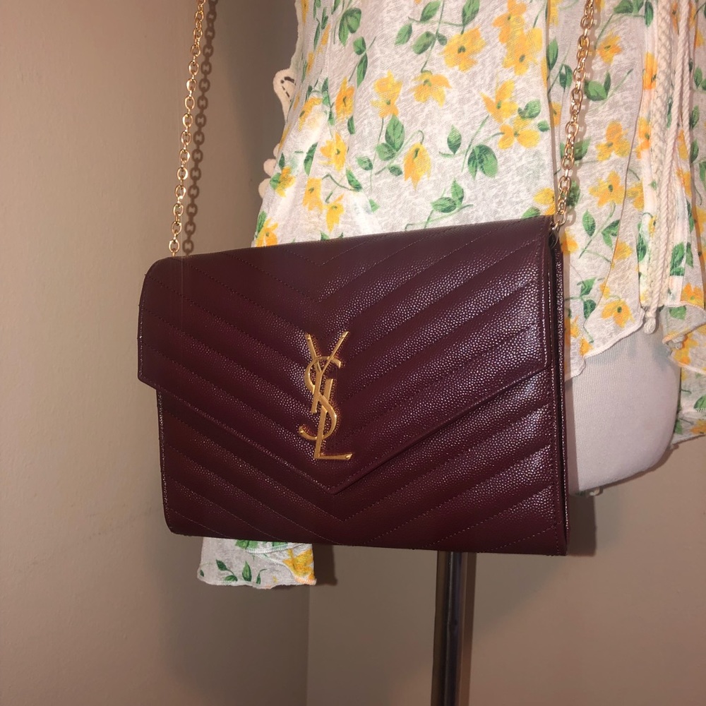 Yves Saint Laurent Dark Red Clutch with Gold Logo